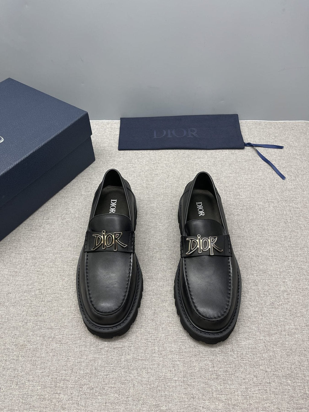 Dior Men's Black Gold-Plaque Slip-On Shoes