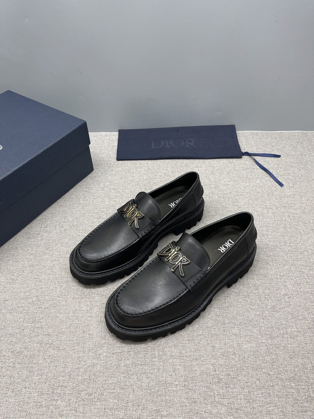 Dior Men's Black Gold-Plaque Slip-On Shoes